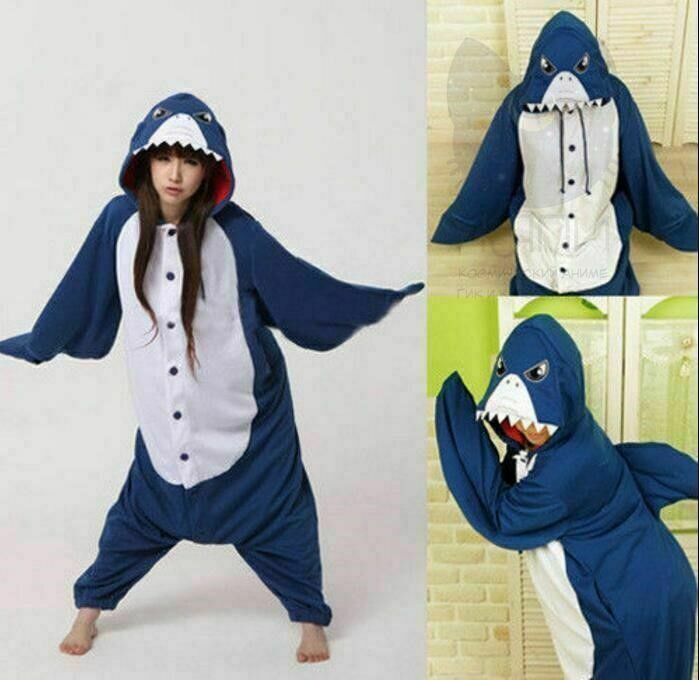 Kigurumi being wriggled with sheathed penis